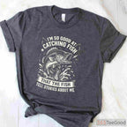 Expert Angler Catching Fish Design - Bold Graphic Tee for Skilled Fishermen