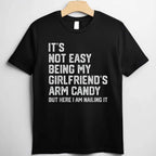 It’s Not Easy Being My Girlfriend’s Arm Candy Funny T-Shirt Tee Boyfriend Fathers Day Gift