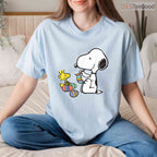 Peanuts Snoopy Woodstock Easter Egg Painting T-Shirt Cute Cartoon Holiday Tee